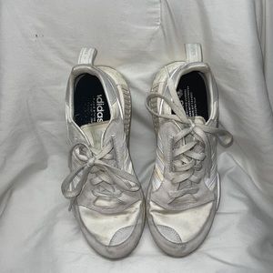 Gray + Off-White (color not brand) Addidas NMDs